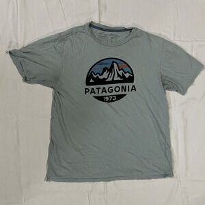 Patagonia Light Blue Graphic Tee with Multicolor Logo